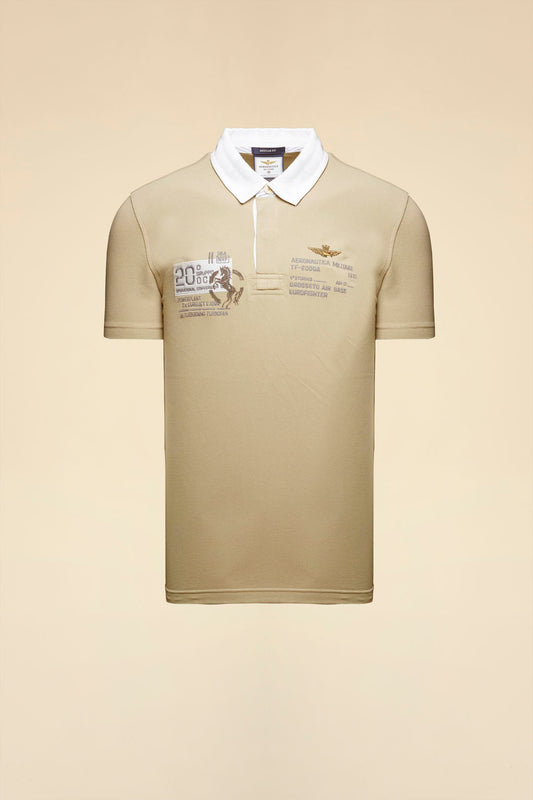 261PO1919UP00404  Polo con ricami del 20° Gruppo OCU